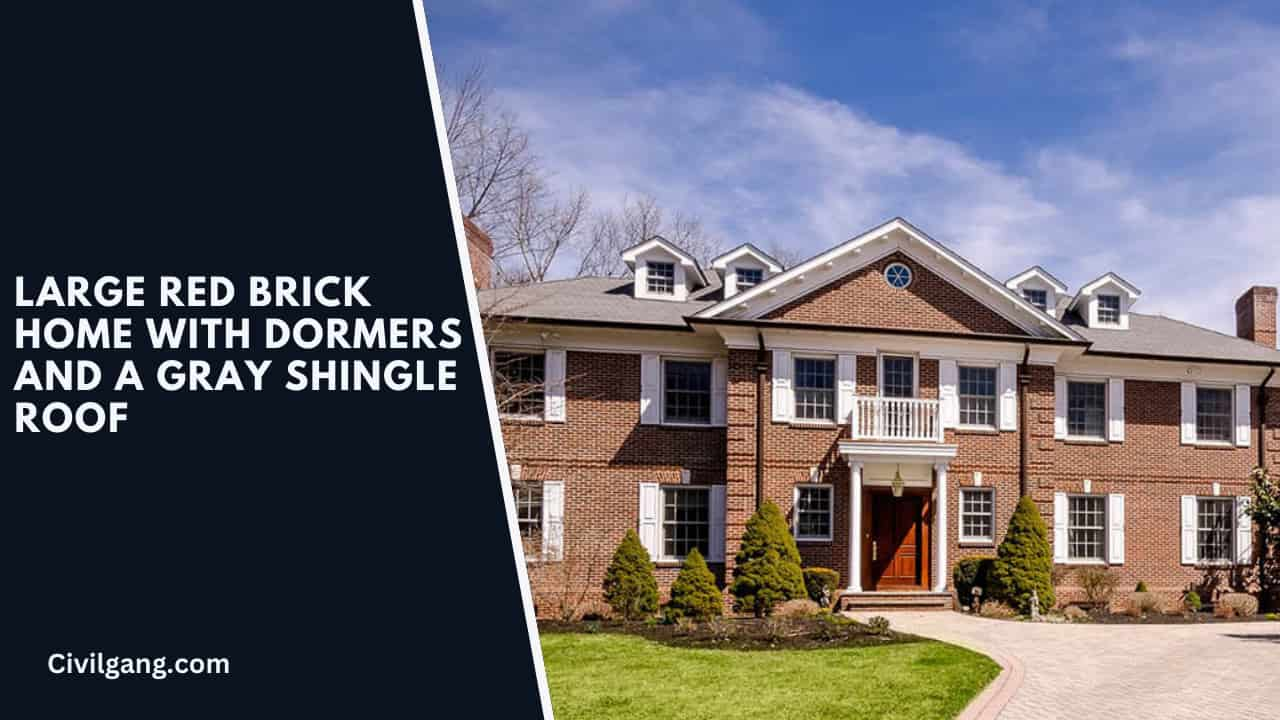 Large Red Brick Home with Dormers and a Gray Shingle Roof